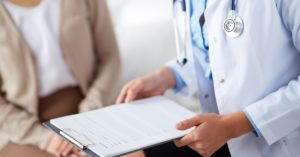 doctor holding clipboard